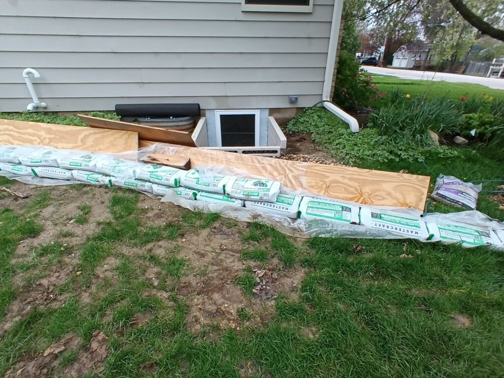 before photo of drainage and grading project in a Waukesha County yard