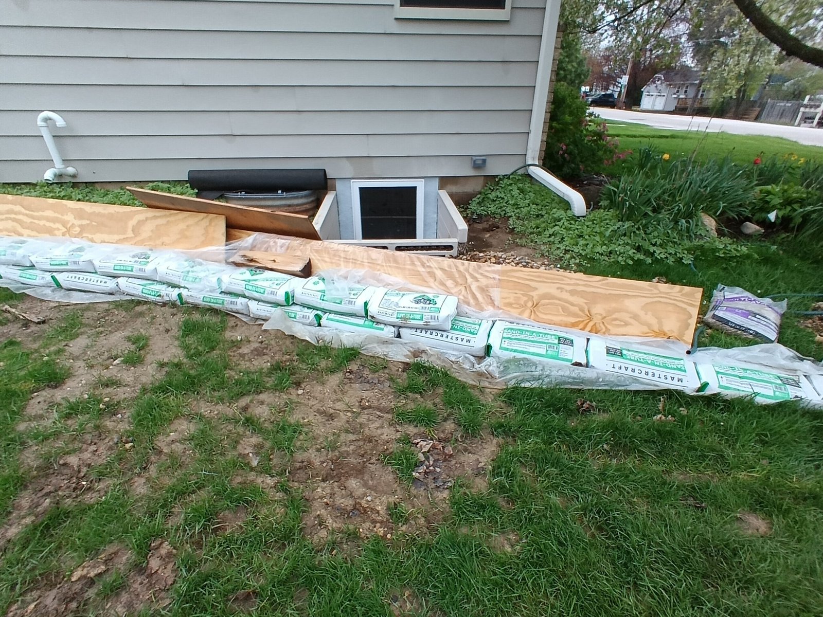 before photo of drainage and grading project in a Waukesha County yard