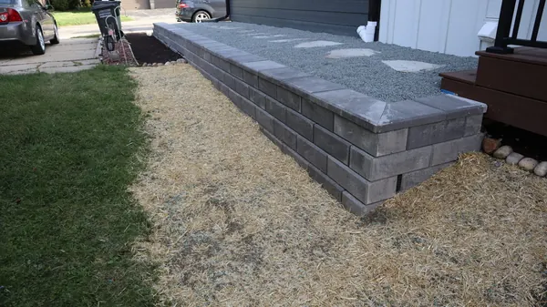 Completed retaining wall landscaping project in Waukesha County