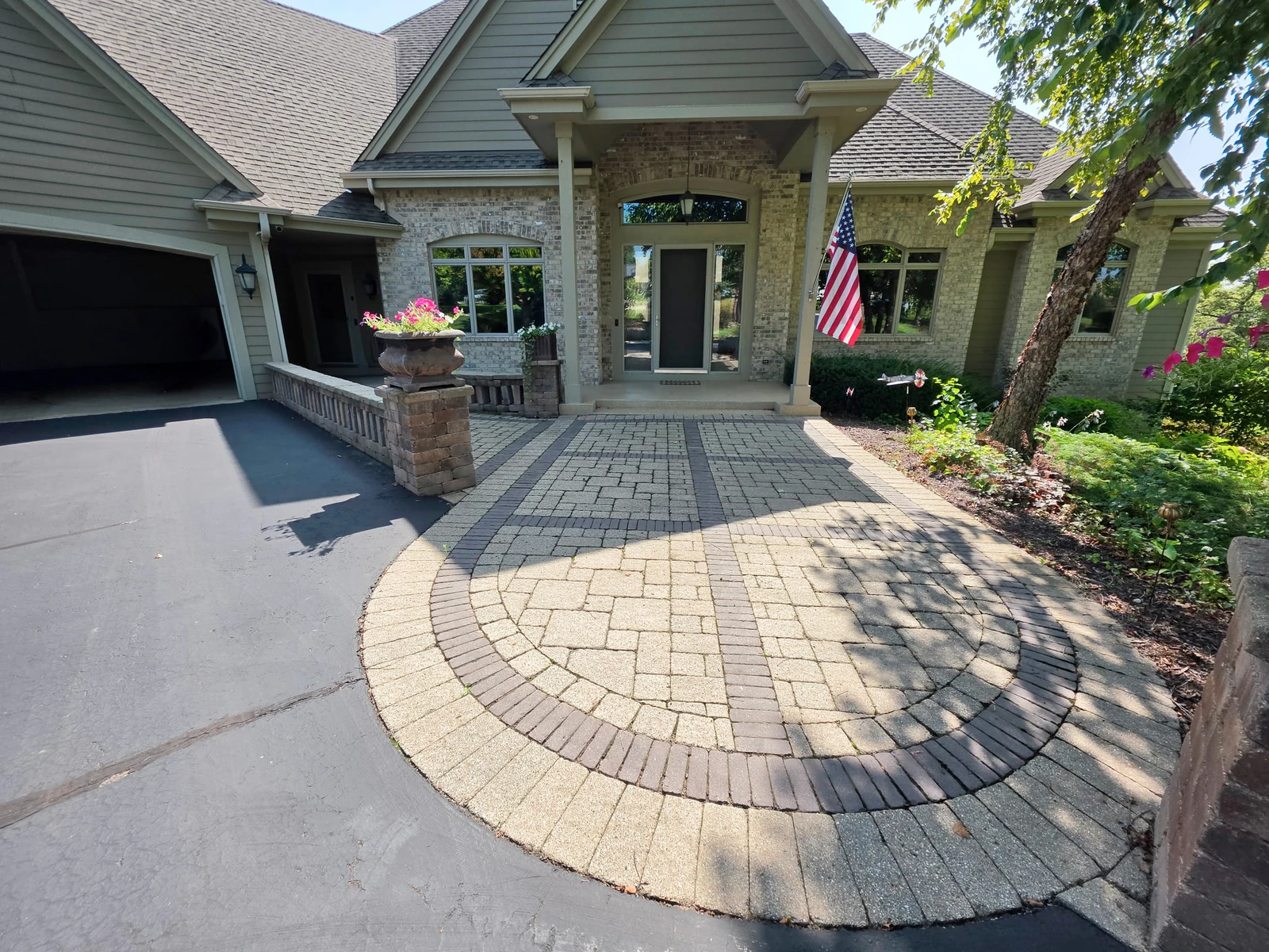 Original front-entry pavers with inset borders before the Oasis project